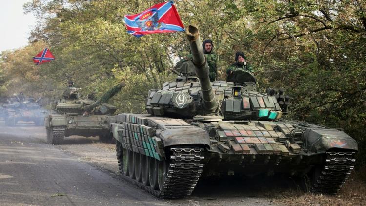 Des soldats séparatistes prorusses, dans la région de Donetsk en Ukraine, le 21 octobre 2015 [ALEKSEY FILIPPOV / AFP/Archives]