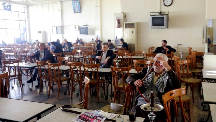 Retour au calme dans un café de Damas le 27 février 2016, au premier jour d'une trêve entre les forces du régime et les rebelles [LOUAI BESHARA / AFP]