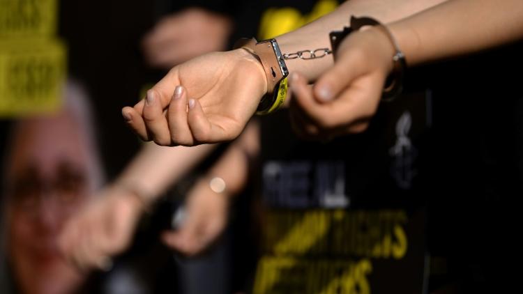 Des militants d'Amnesty international protestent contre des arrestations de leurs membres en Turquie à Rome le 20 juillet 2017 [FILIPPO MONTEFORTE / AFP/Archives]