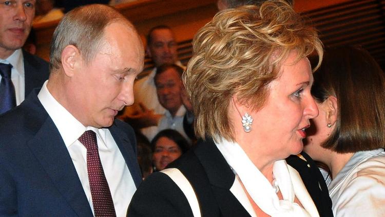 Vladimir Poutine et son ex-femme Lioudmila le 6 juin 2013 à Moscou [Mikhail Klimentyev / Ria-Novosti/AFP/Archives]