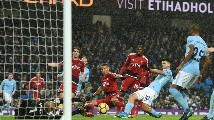 L'attaquant argentin de Manchester City marque lors du match à domicile face à Watford en 22e journée du championnat d'Angleterre le 2 janvier 2018 [Oli SCARFF                           / AFP]