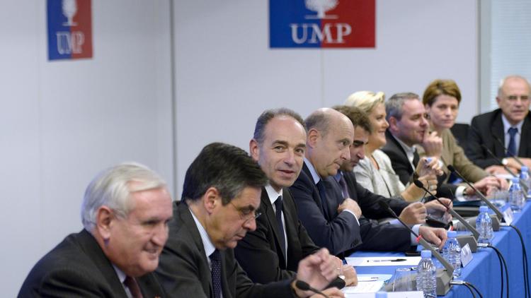 Jean-Pierre Raffarin, François Fillon, Jean-Francois Copé et Alain Juppé le 18 décembre 2013 au siège de l'UMP à Paris  [Martin Bureau / AFP/Archives]