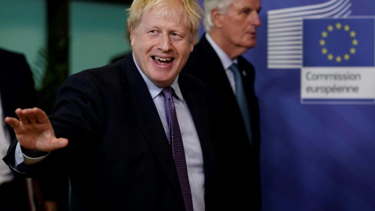 Le Premier ministre britannique Boris Johnson et le négociateur de l'UE Michel Barnier le 17 octobre 2019 à Bruxelles [Kenzo TRIBOUILLARD / AFP/Archives]
