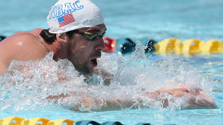 Le nageur américain Michael Phelps à l'entraînement au Skyline Aquatic Center le 24 avril 2014 à Mesa, Arizona [Christian Petersen / AFP]