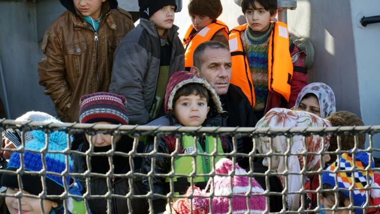 Des migrants à leur arrivée le 8 février 2016 à Lesbos [STRINGER / AFP/Archives]