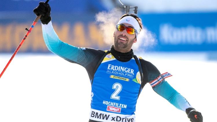 Le Français Martin Fourcade remporte la poursuite lors du biathlon d'Hochfilzen le 15 décembre 2018 [JOE KLAMAR / AFP]