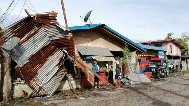 Une maison endommagée par le typhon Phanfone à Ormoc City (Philippines) le 25 décembre 2019 [RONALD FRANK DEJON / AFP]