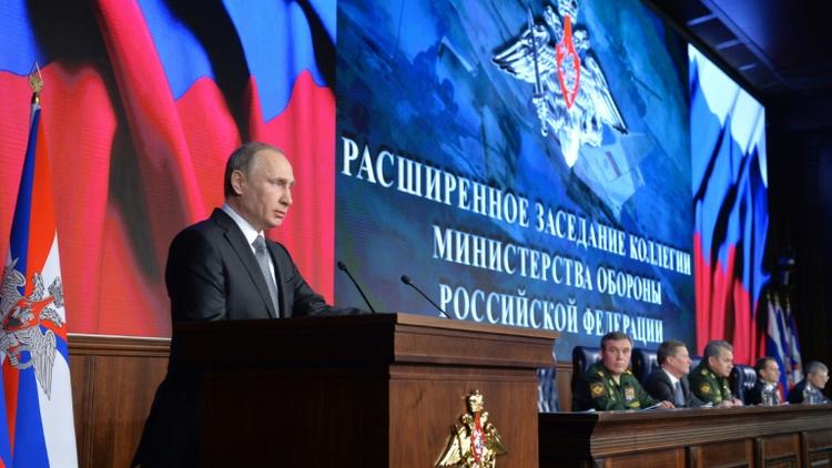 Le président russe Vladimir Poutine lors d'une réunion avec le conseil de la Défense à Moscou, le 11 décembre 2015 [ALEXEI DRUZHININ / SPUTNIK/AFP]