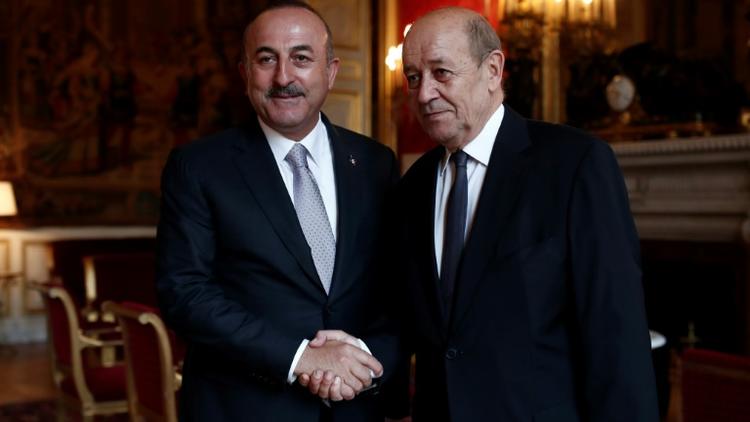 Le ministre français des Affaires étrangères, Jean-Yves Le Drian, et son homologue turc Mevlut Cavusoglu, au Quai d'Orsay, le 30 septembre 2018 [BENOIT TESSIER / POOL/AFP/Archives]
