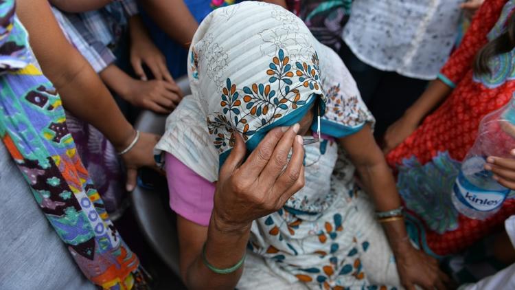 La grand-mère d'une enfant violée le 17 octobre 2015 à New Delhi [Chandan Khanna / AFP]