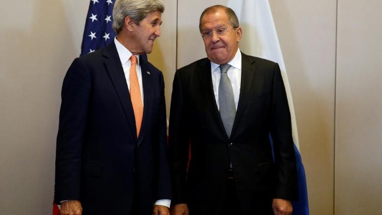Le secrétaire d'Etat américain John Kerry et le ministre des Affaires étrangères russes Sergei Lavrov à Genève, le 9 septembre 2016 [KEVIN LAMARQUE / POOL/AFP/Archives]