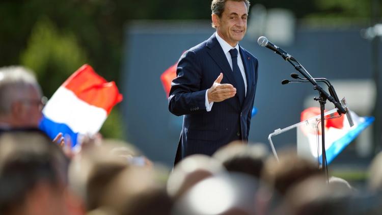 Nicolas Sarkozy à la tribune, le 5 septembre 2015, lors d'un meeting des Républicains à La Baule (Loire-Atlantique) [JEAN-SEBASTIEN EVRARD / AFP/Archives]