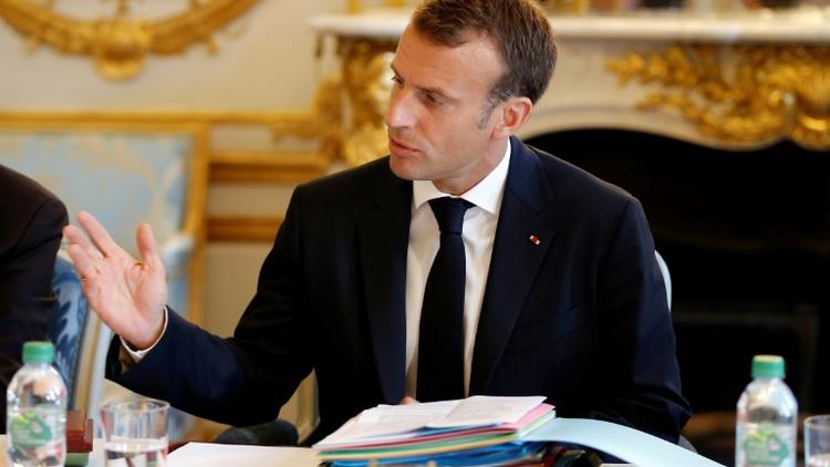 Le président français Emmanuel Macron à L'Elysée le 03 août 2018 [Michel Euler / POOL/AFP/Archives]