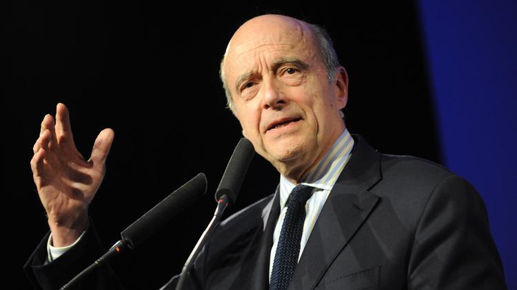 Alain Juppé participe le 8 mars 2014 à Pau à un meeting électoral du MoDem [Gaizka Iroz / AFP/Archives]