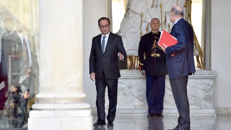François Hollande et Jean-Marie Le Guen à la sortie du conseil des ministres le 12 octobre 2016 à l'Elysée à Paris [ALAIN JOCARD / AFP]