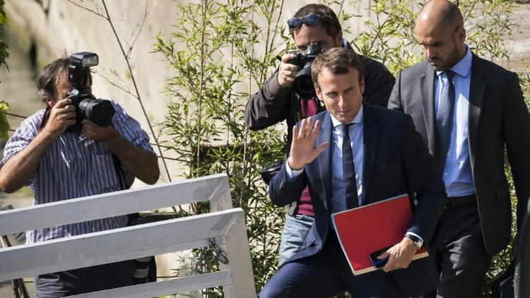Emmanuel Macron de retour à Bercy après avoir démissionné du gouvernement le 30 août 2016 à Paris  [LIONEL BONAVENTURE / AFP]