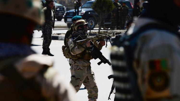 Des forces de sécurité afghanes à Kaboul le 25 mars 2014 [Roberto Schmidt / AFP/Archives]