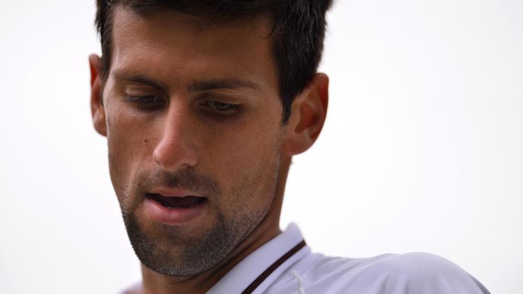 Le Serbe Novak Djokovic en quart de finale du tournoi de Wimbledon le 3 juillet 2013 à Londres [Carl Court / AFP]