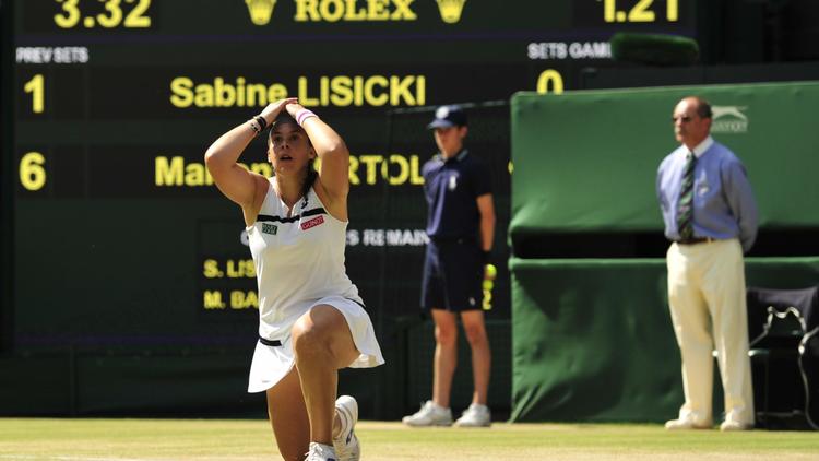 Marion Bartoli remporte le tournoi de Wimbledon, le 6 juillet 2013 [Glyn Kirk / AFP]
