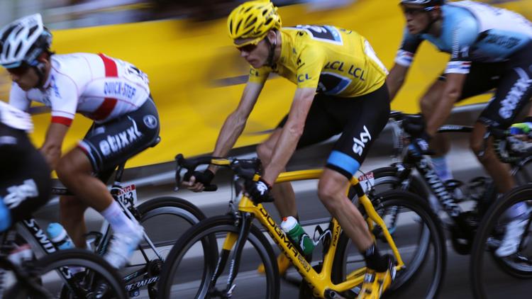 Le maillot jaune Christopher Froome lors de la dernière étape du Tour de France le 21 juillet 2013 à Paris [Jeff Pachoud / AFP]