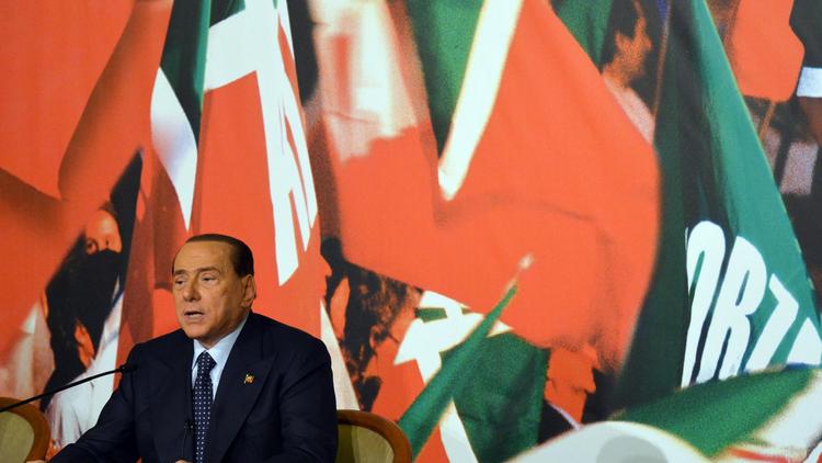 L'ancien Premier ministre italien Silvio Berlusconi lors d'une conférence de presse à Rome, le 25 novembre 2013 [Gabriel Bouys / AFP]