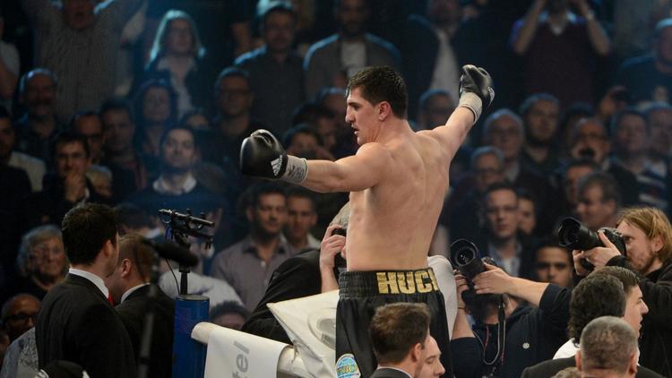 Le boxeur allemand d'origine serbe Marco Huck après sa victoire contre Firat Arslan, le 25 janvier 2014 à Stuttgart [Franziska Kraufmann / DPA/AFP/Archives]