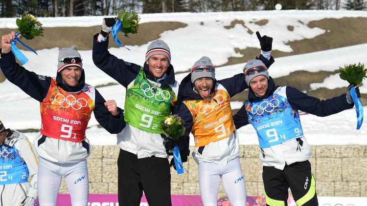 Les Français, Ivan Perrillat Boiteux, Jean-Marc Gaillard, Maurice Manificat et Robin Duvillard, sur le podium du 4x10 km messieurs de ski de fond des JO de Sotchi, le 16 février 2014 [ / AFP]