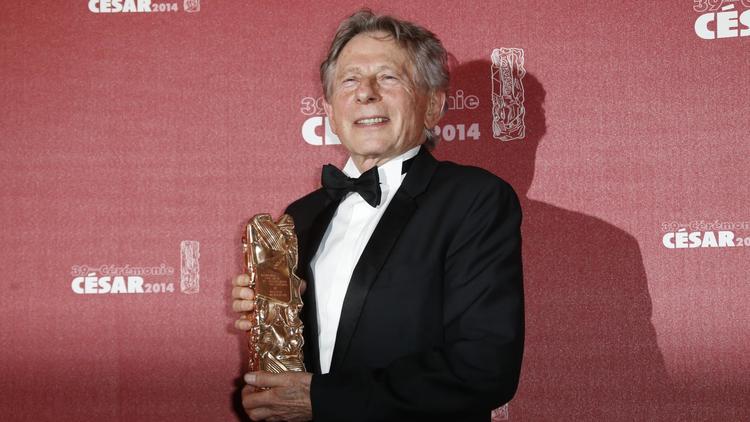 Le Franco-Polonais Roman Polanski tient le César du meilleur réalisateur, à Paris le 28 février 2014 [Thomas Samson / AFP/Archives]