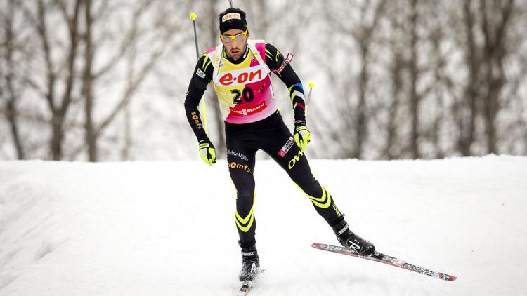 Le Français Martin Fourcade pendant le 10 km sprint de la Coupe du monde de biathlon le 20 mars 2014 à Oslo [ / Scanpix/AFP]