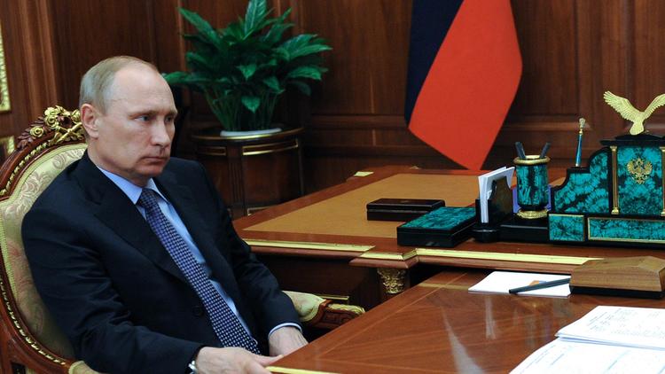 Le président russe Vladimir Poutine au Kremlin, le 31 mai 2014 à Moscou [Mikhail Klimentyev / Ria-Novosti/AFP/Archives]