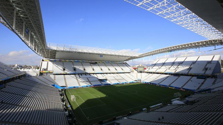 Une vue de la Corinthians Arena de Sao Paulo, où aura lieu le premier match de la Coupe du Monde de football, le 11 juin 2014. [Adrian Dennis / AFP]
