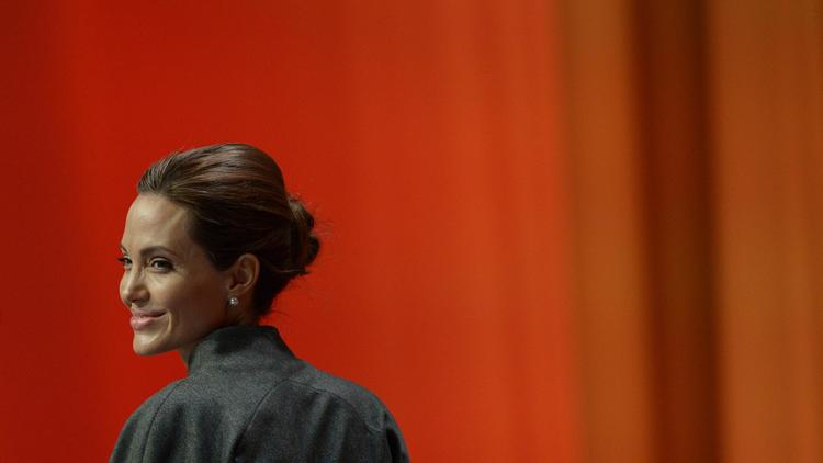 L'actrice américaine Angelina Jolie lors du sommet sur les violences sexuelles en temps de conflit, le 13 juin 2014 à Londres [Carl Court / AFP]