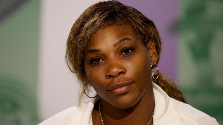 La joueuse de tennis américaine Serena Williams lors d'une conférence de presse consécutive à sa défaite au 3e tour de l'édition 2014 du tournoi de Wimbledon, le 28 juin 2014. [- / AFP/Archives]