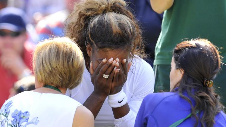 La N.1 mondiale Serena Williams lors de son abandon en double à Wimbledon, le 1er juillet 2014 [Glyn Kirk / AFP/Archives]