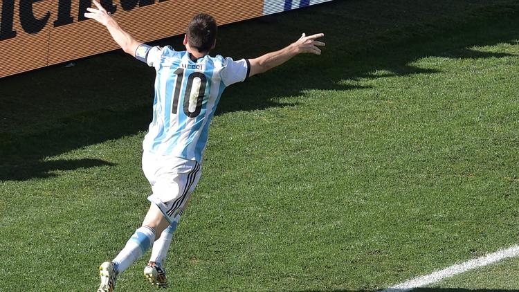 La joie de Lionel Messi après le but d'Angel Di Maria pour l'Argentine face à la Suisse, le 1er juillet 2014 à Sao Paulo [Gabriel Bouys / AFP]