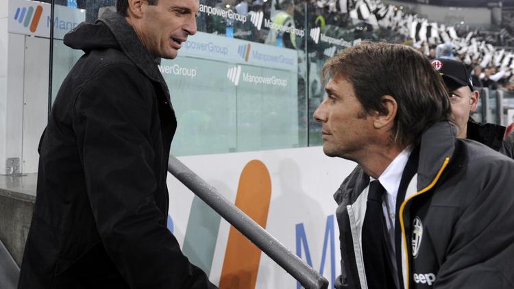 Les entraîneurs Massimiliano Allegri (g) et Antonio Conte, le 6 octobre 2013 à Turin [Alberto Lingria / AFP/Archives]