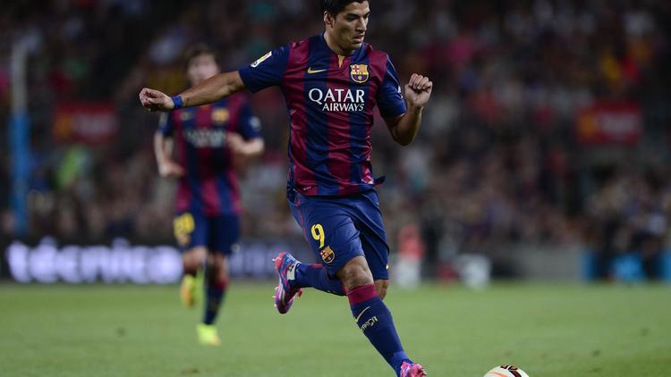 L'attaquant Luis Suarez lors de ses débuts avec le FC Barcelone en amical à l'occasion du Trophée Gamper, le 18 août 2014  au Camp Nou [Josep Lago / AFP]