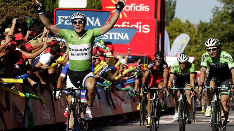 Le coureur allemand de l'équipe Giant John Degenkolb célèbre sa victoire au sprint sur la 5e étape du Tour d'Espagne, courue le 27 août 2014 entre Priego de Cordoba et Ronda. [Jose Jordan / AFP]