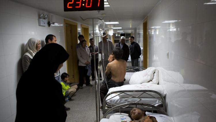 Des victimes du tremblement de terre qui a frappé le Yunnan dans un hôpital de Zhaotong, le 3 août 2014 [ / AFP]