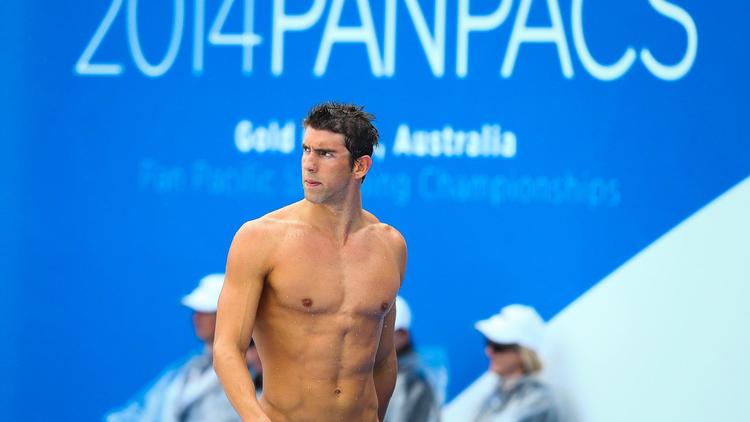 Michael Phelps lors du 100 m nage libre des Championnats PanPacifiques 2014 le 22 août à Gold Coast [Patrick Hamilton / AFP]