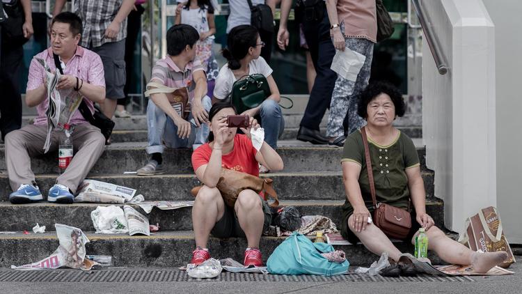 Des touristes chinois à Hong-Kong, le 2 octobre 2013 [Phillipe Lopez / AFP]