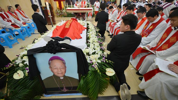 Célébration des funérailles de l'évêque chinois Mgr Joseph Fan Zhongliang à Shanghai le 22 mars 2014 [Peter Parks / AFP]