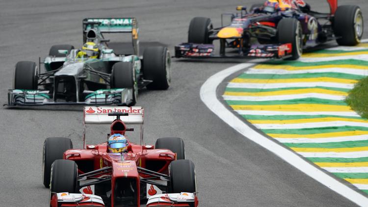 Des F1 lors du Grand Prix du Brésil, le 24 novembre 2013 à Sao Paulo [Vanderlei Almeida / AFP/Archives]