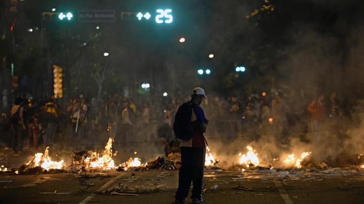 Manifestation d'étudiants contre le gouvernement de Nicolas Maduro, le 20 février 2014 à Caracas [Juan Barreto / AFP]