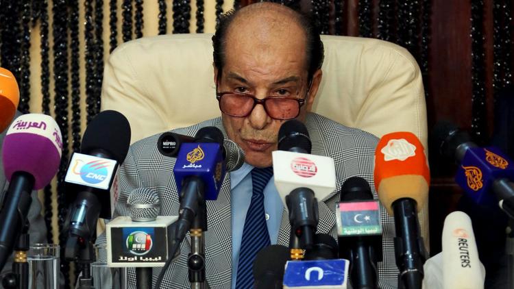 Le procureur général libyen Abdelkader Radouane lors d'un point de presse à la veille du procès de Seif al-Islam, fils de Mouammar Kadhafi, le 18 septembre 2013 à Tripoli [Mahmud Turkia / AFP]