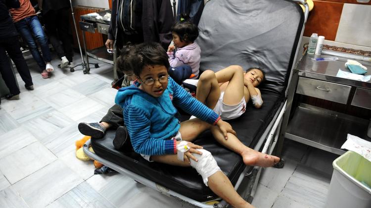 Des enfants syriens blessés, hospitalisés à Damas le 29 novembre 2013 [ / Sana/AFP/Archives]