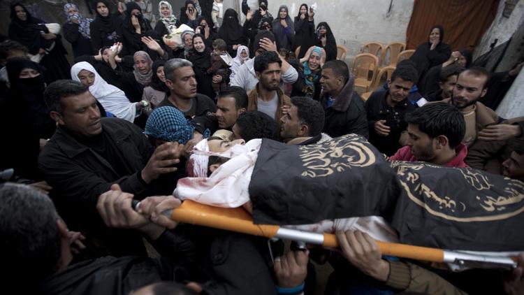 Funérailles de Shaher Abu Shanab, un des trois combattanst du Jihad islamique tué par un raid israélien à Gaza, le 11 mars 2014 [Mahmud Hams / AFP]