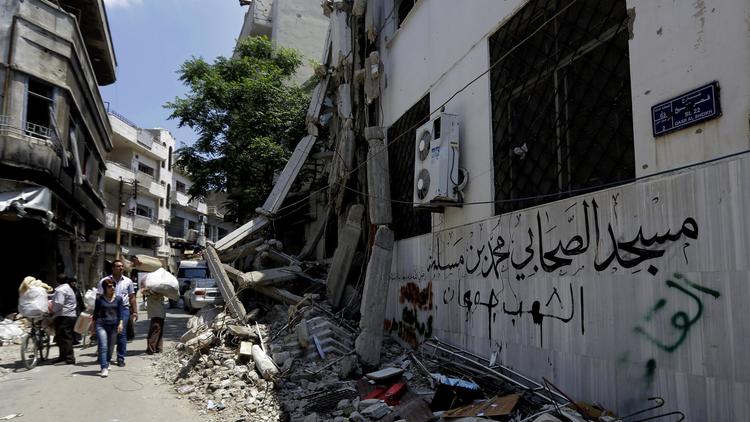 Les rues dévastées de Homs le 12 mai 2014 [Joseph Eid / AFP/Archives]