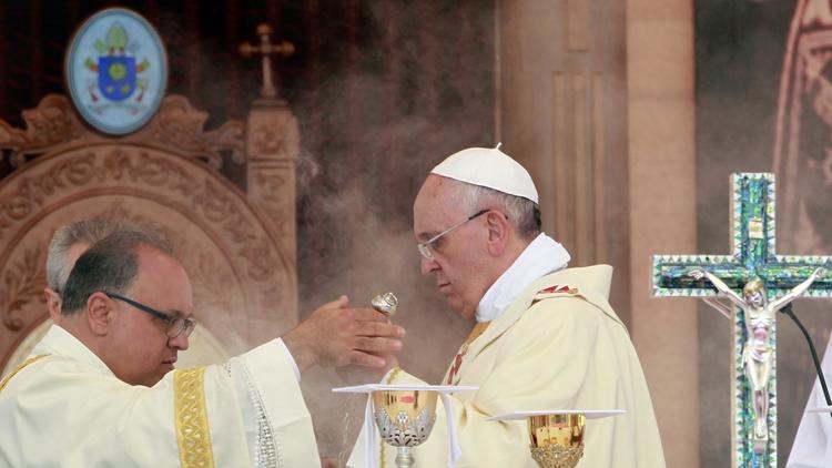 Le pape François  célèbre une messe, le 24 mai 2014 à Amman  [Khalil Mazraawi / AFP]