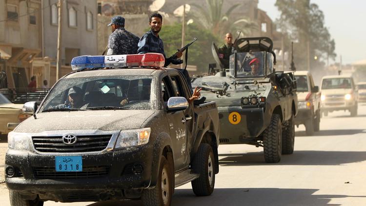 Les forces de sécurité patrouillent à Benghazi, en Libye le 25 juin 2014 [Abdellah Doma / AFP]